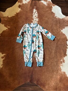 Amazon White Kids One-Piece Romper with Turquoise Trim and Orange Cactus Accents